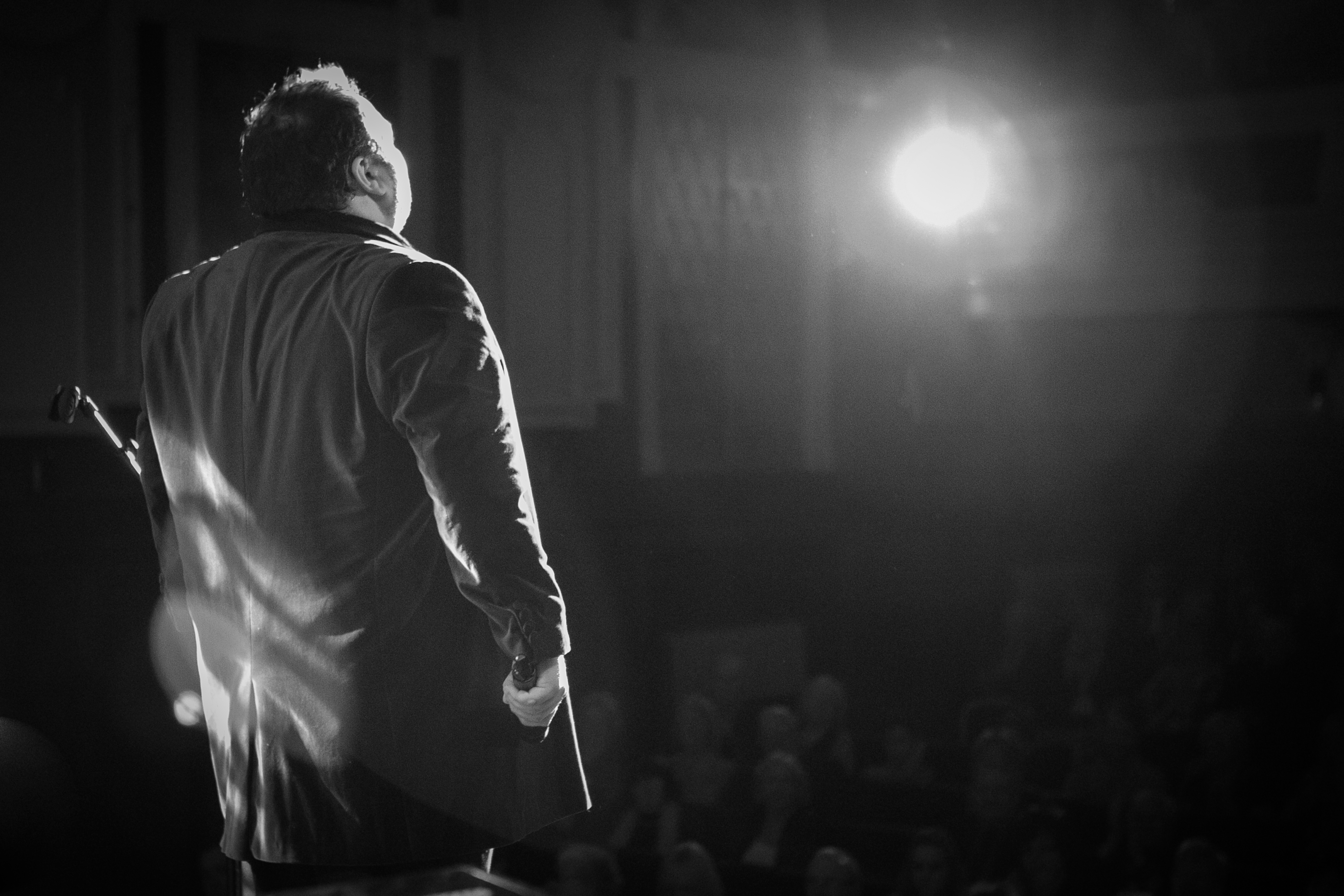 Shot of performer Wyn Evans from stage view