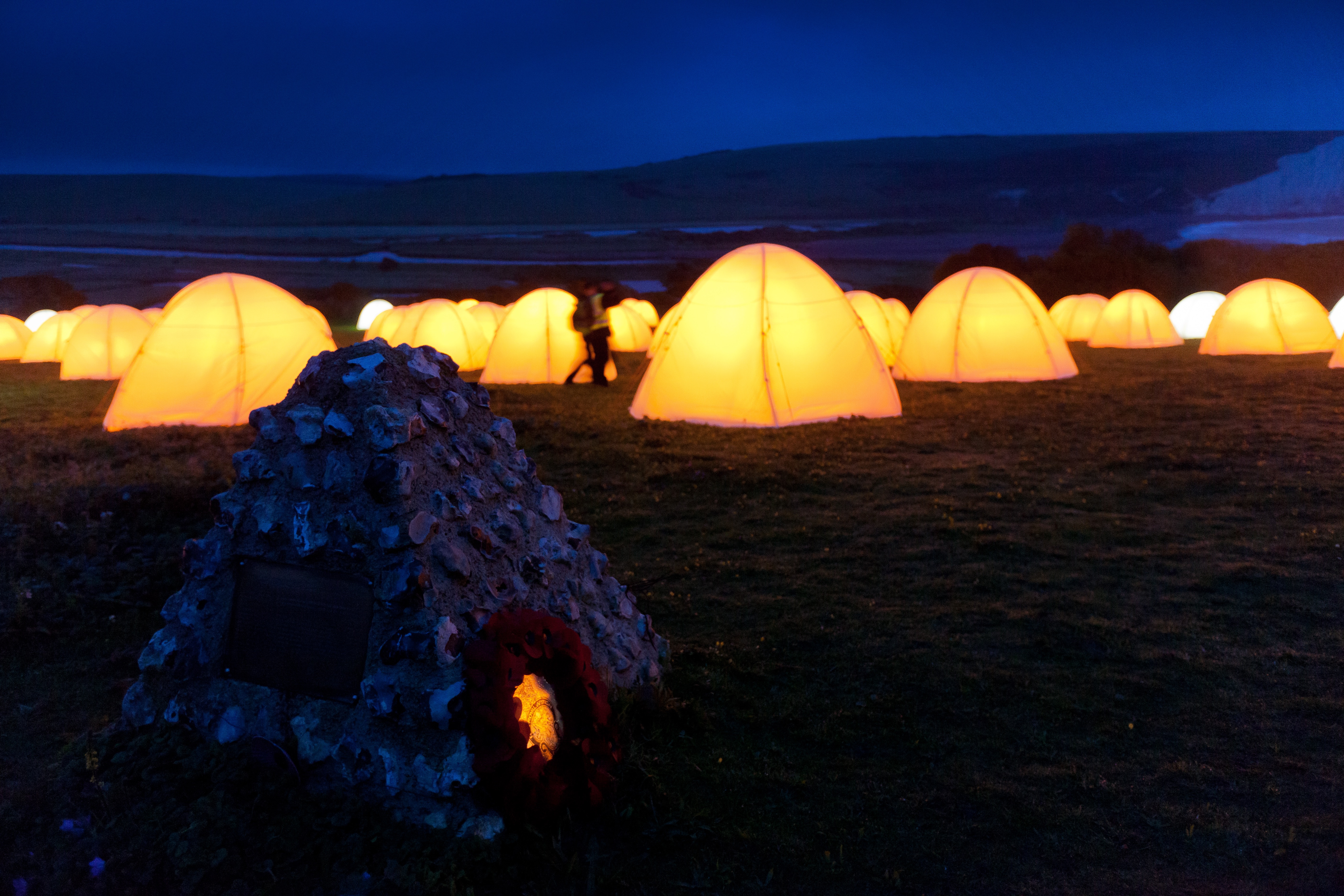 Glowing encampment on a UK coast