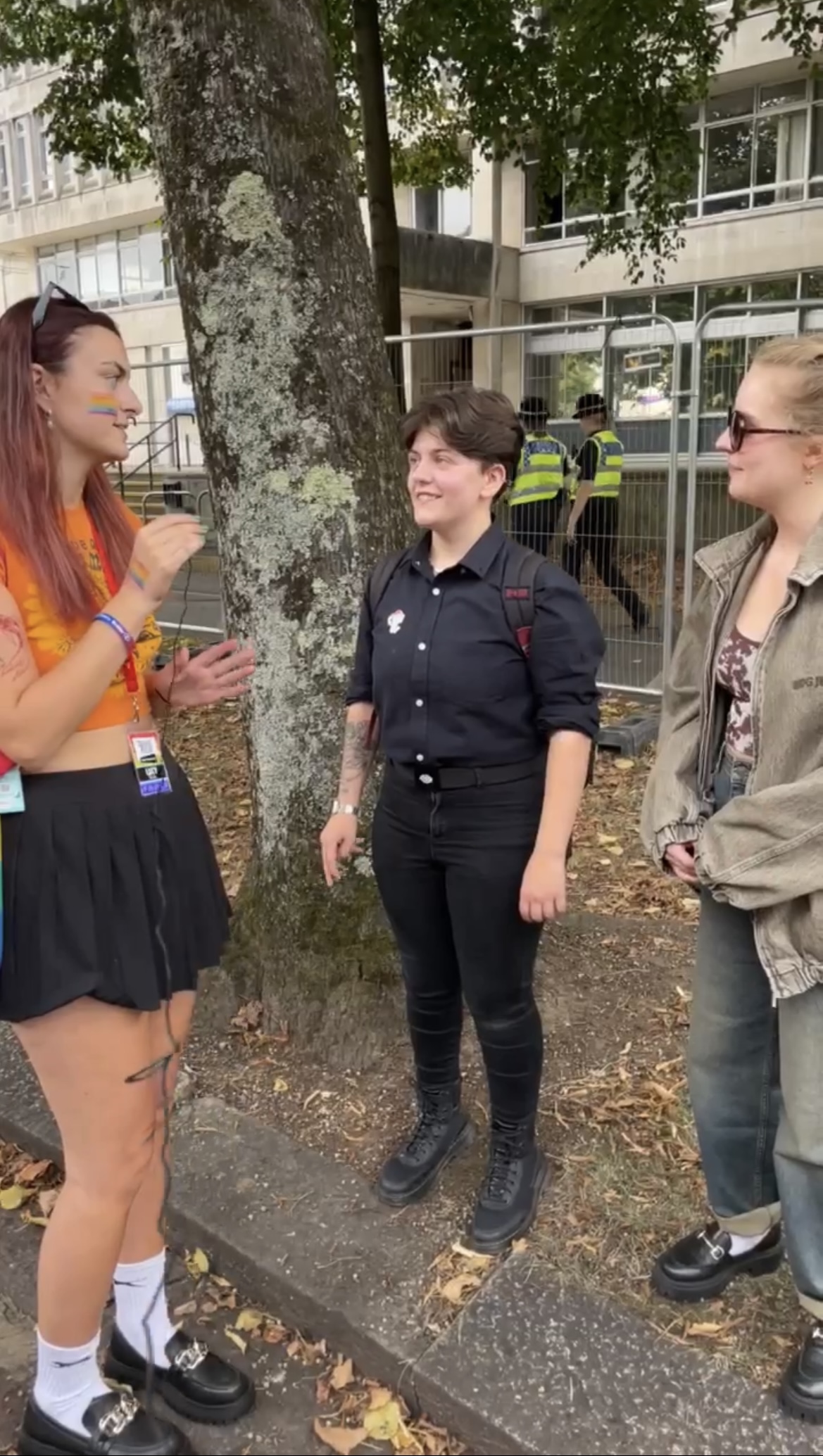 Red haired woman (me) is interviewing two other women at Pride Cymru