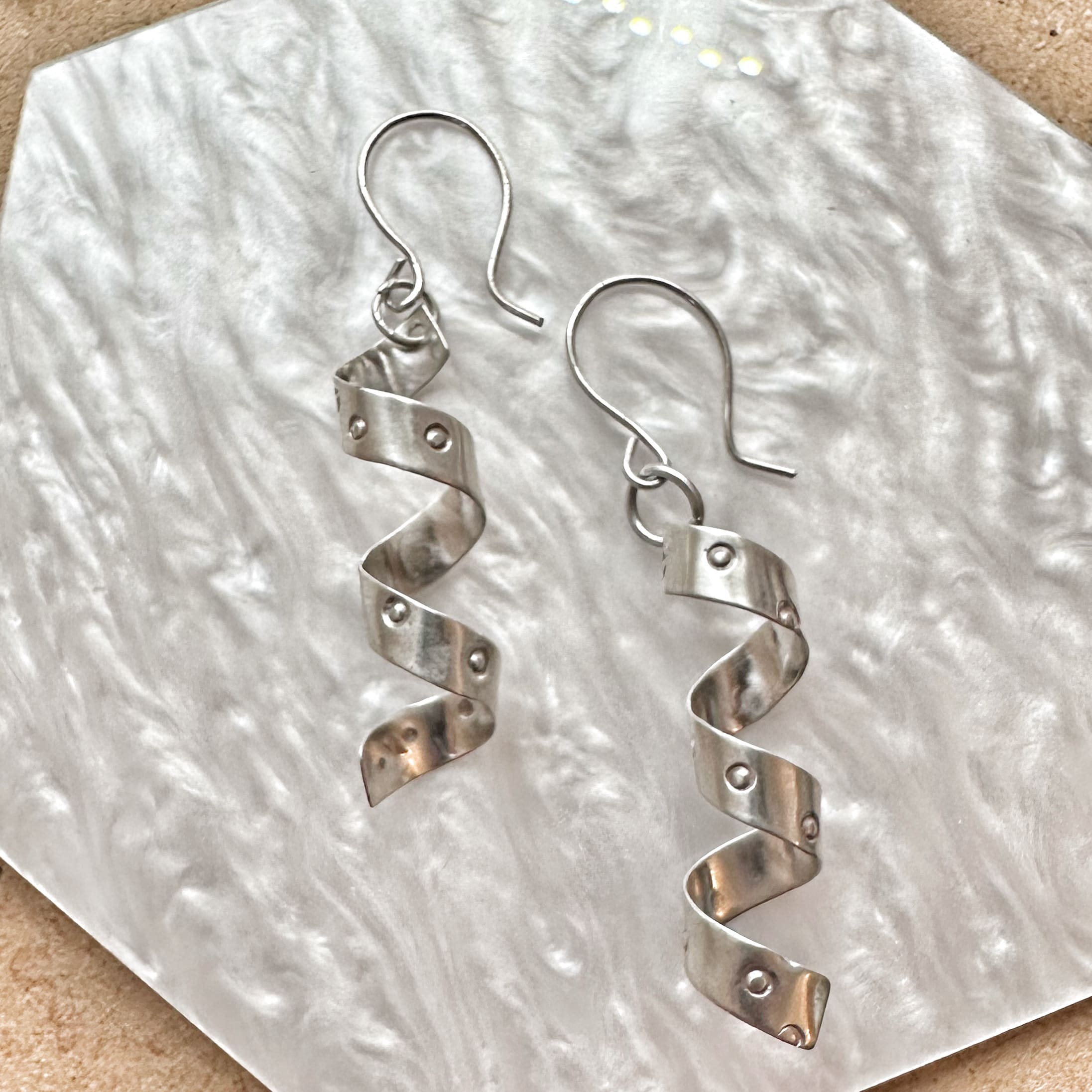 Corkscrew earrings in silver. Hand stamped and formed. 
