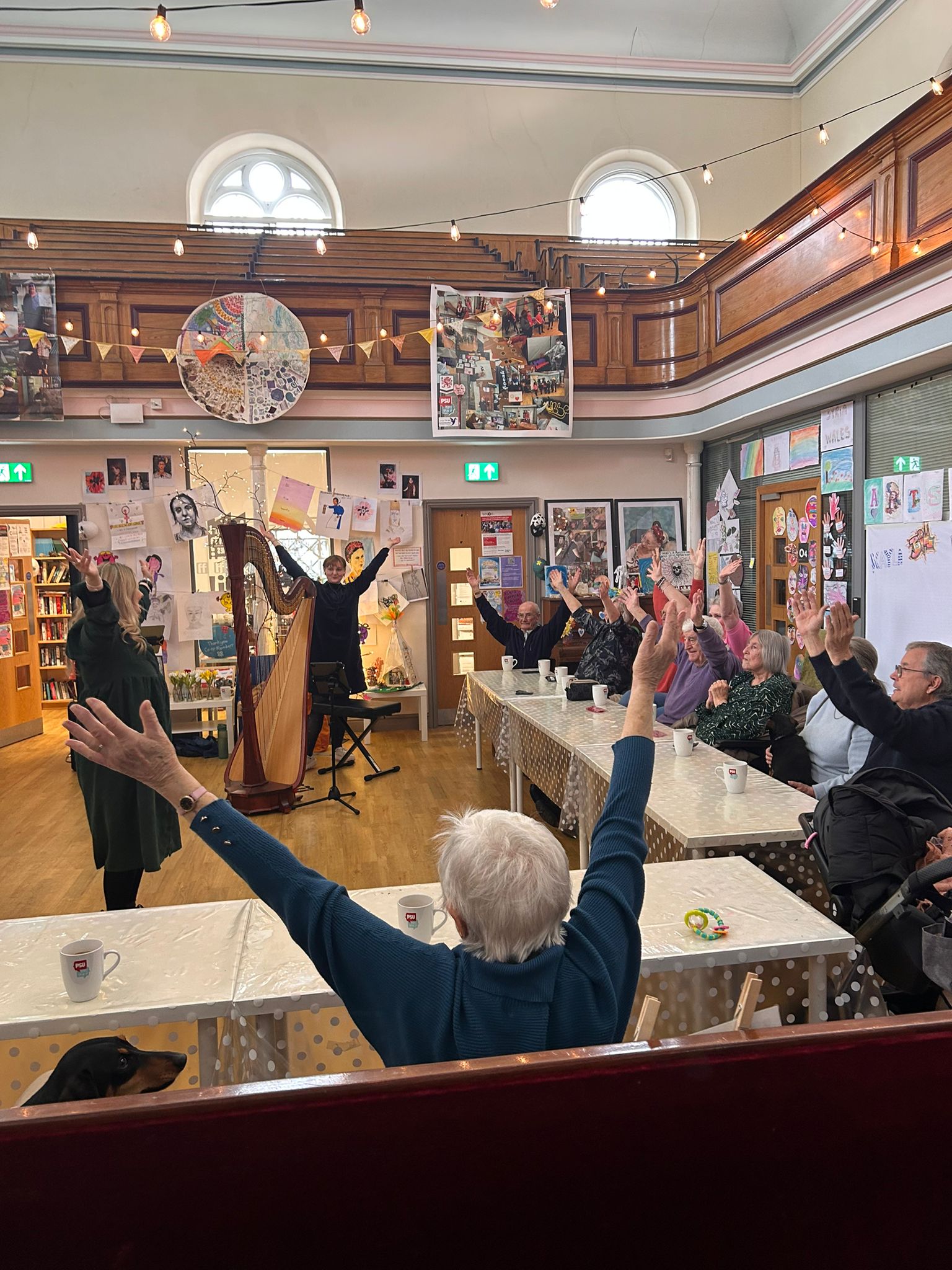 Elevenses Dementia group singing with a harp