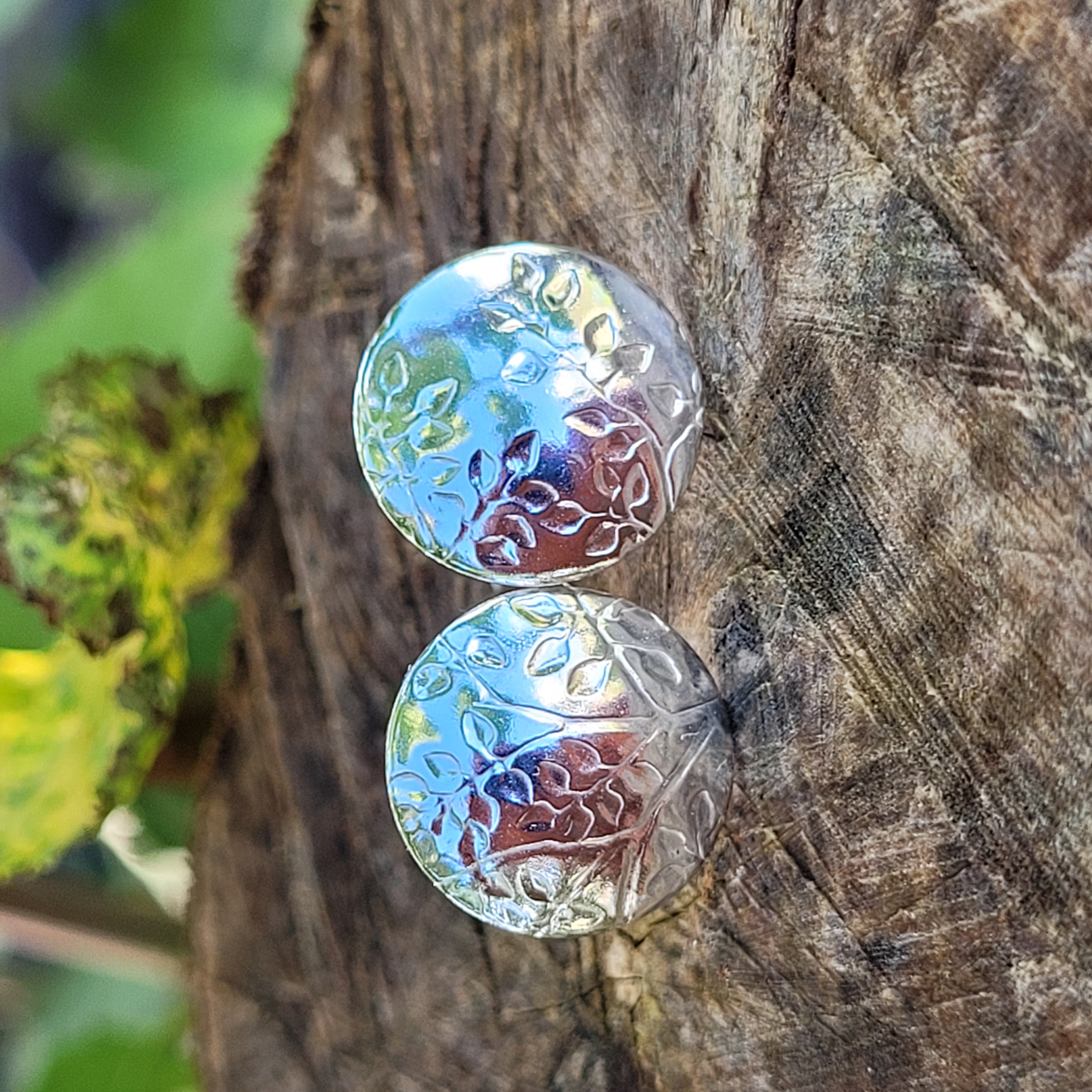 A pair of sterling silver earrings showing Beech leaves