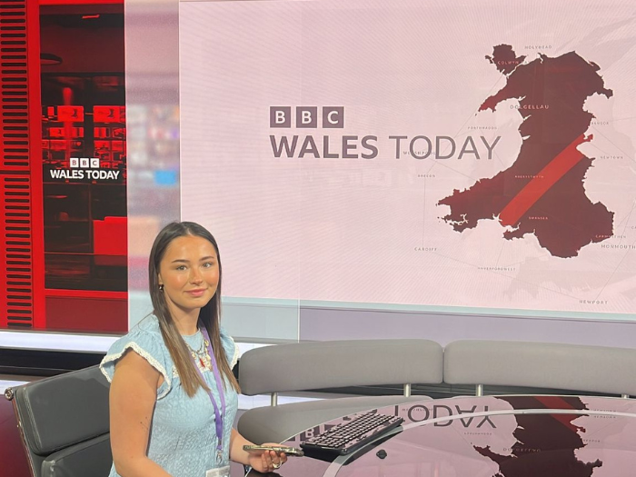 Maya presenting the news