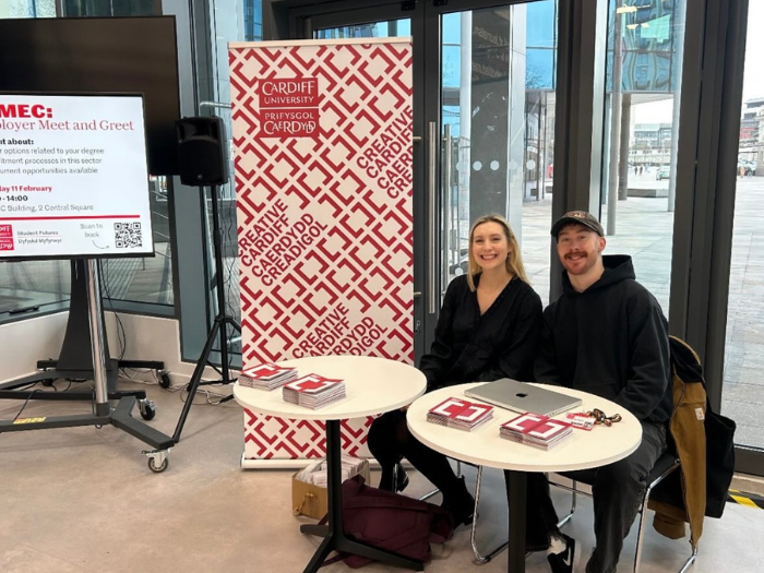 Carys and John meeting students at the School of Journalism, Media and Culture